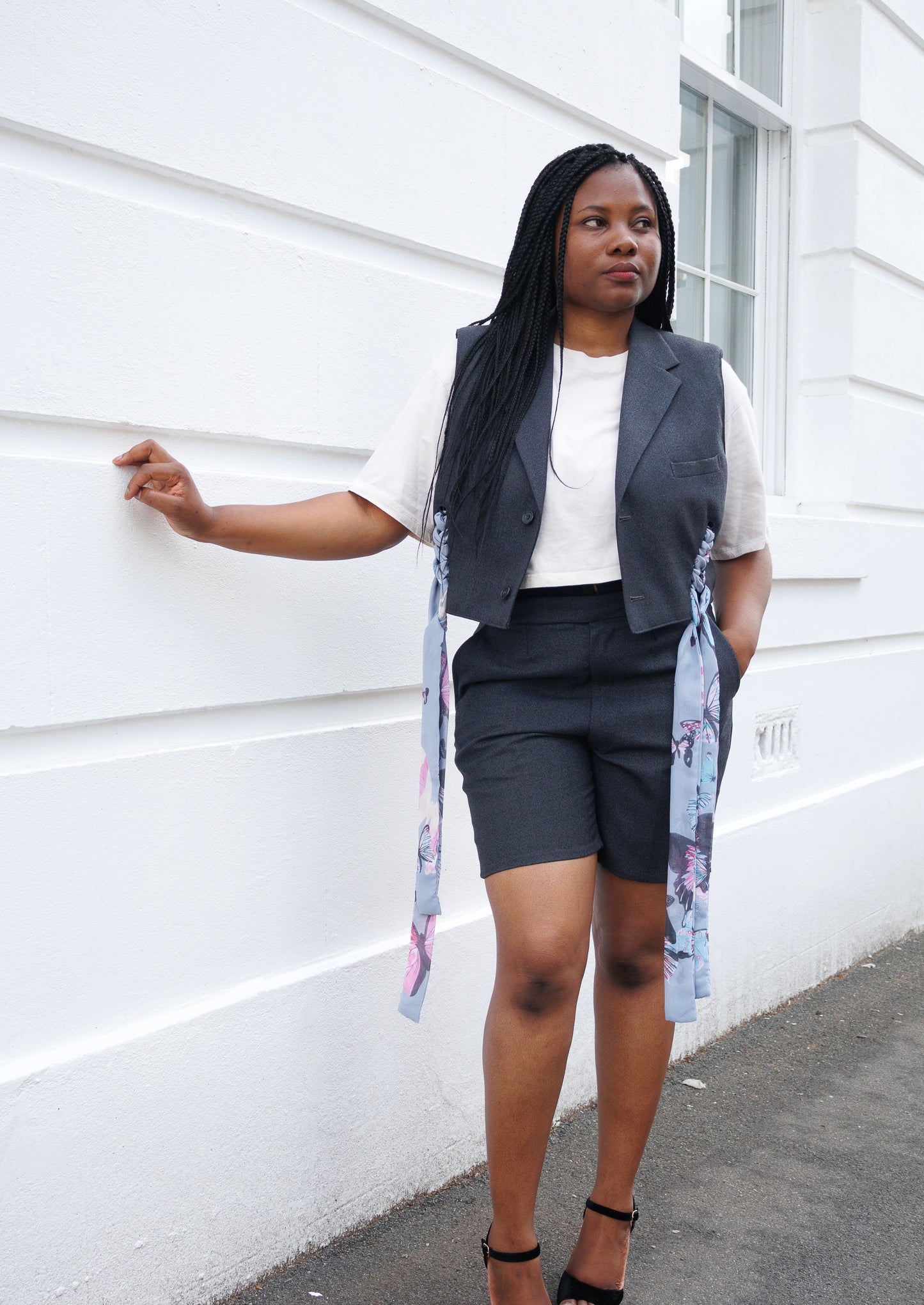 Upcycled waistcoat with straps