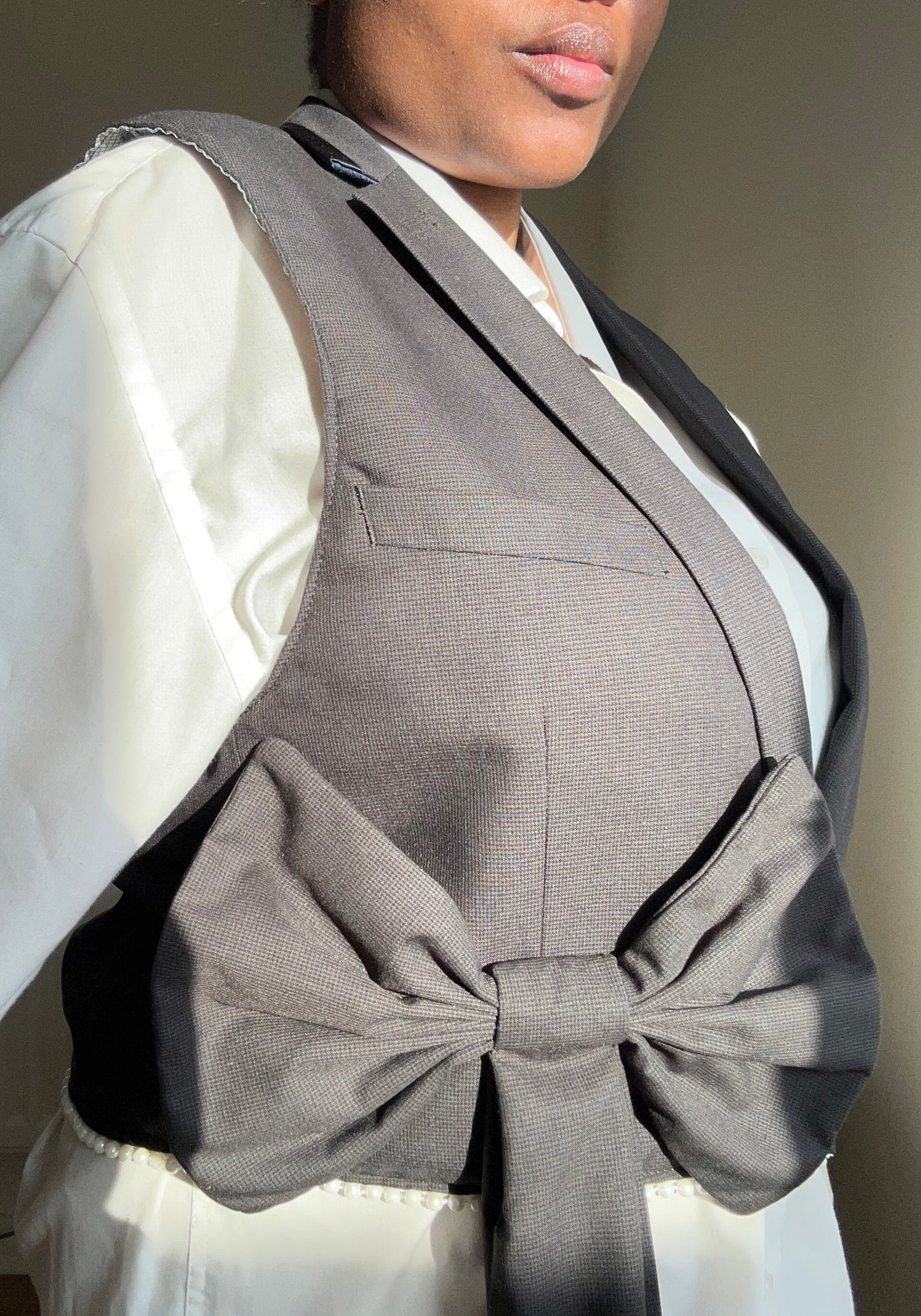 Upcycled waistcoat with a bow