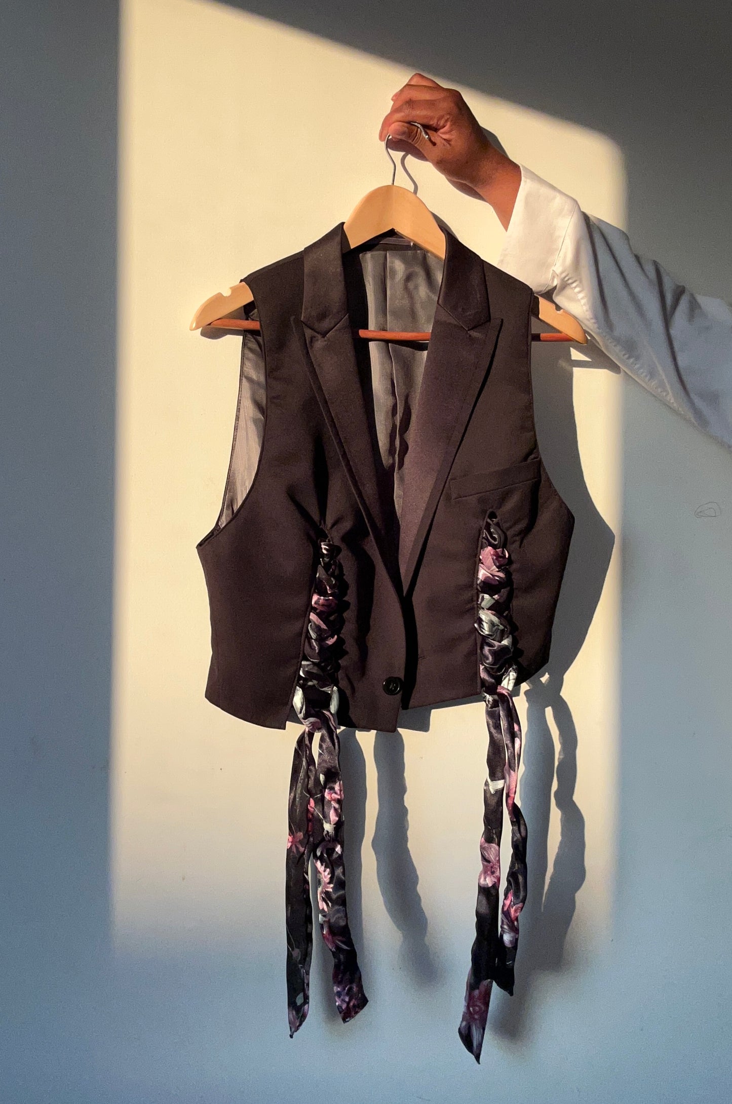 Upcycled waistcoat with straps