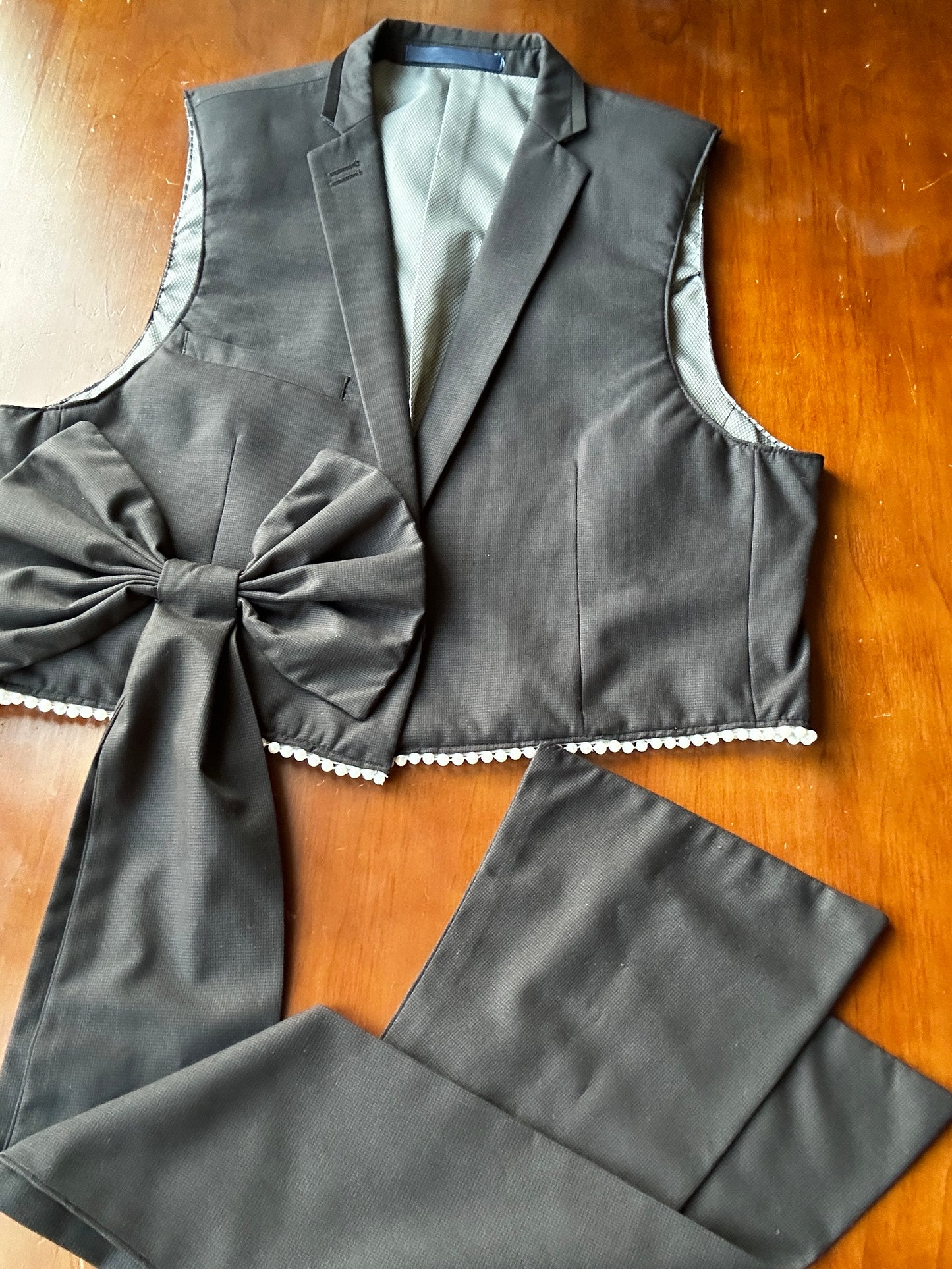 Upcycled waistcoat with a bow