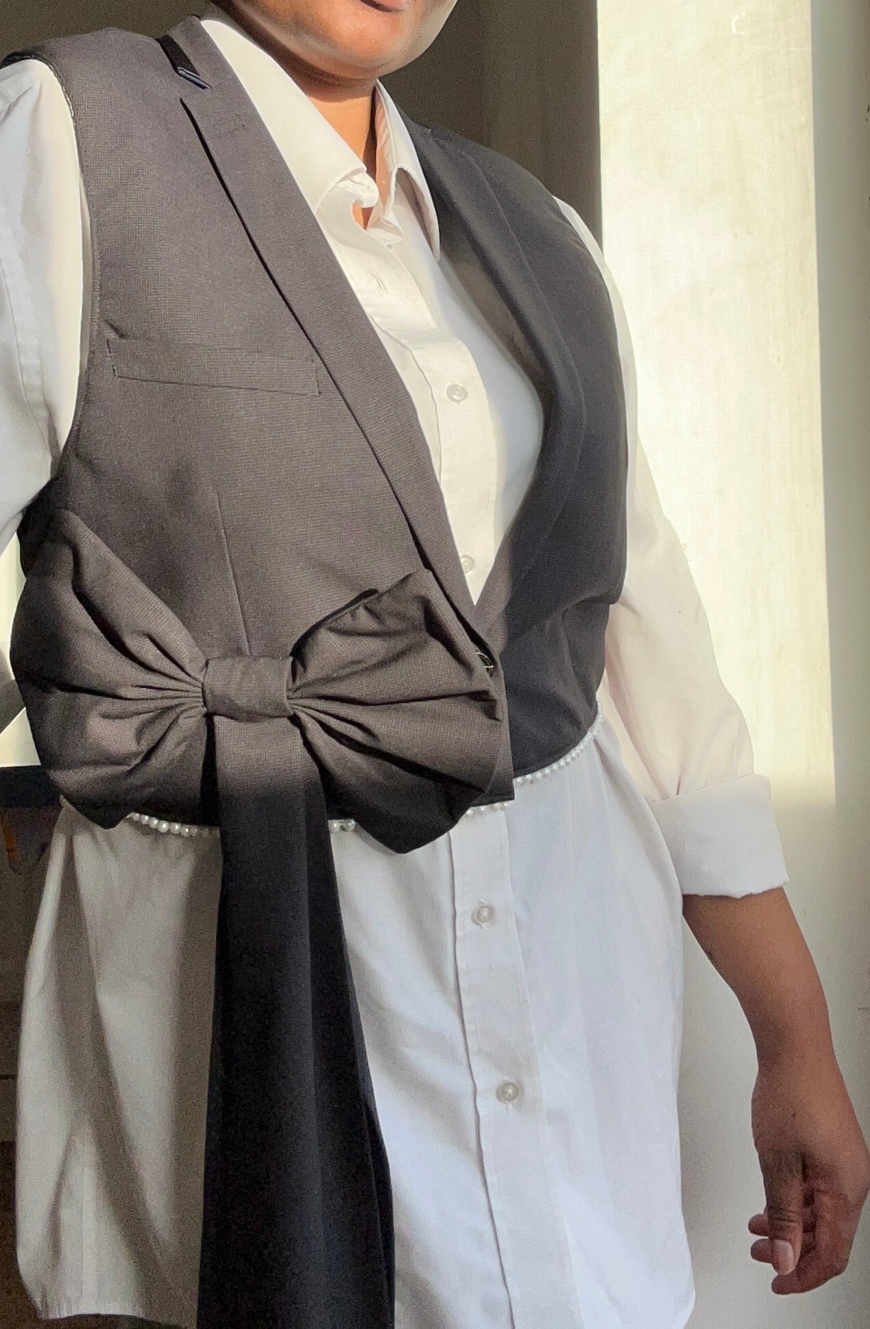 Upcycled waistcoat with a bow