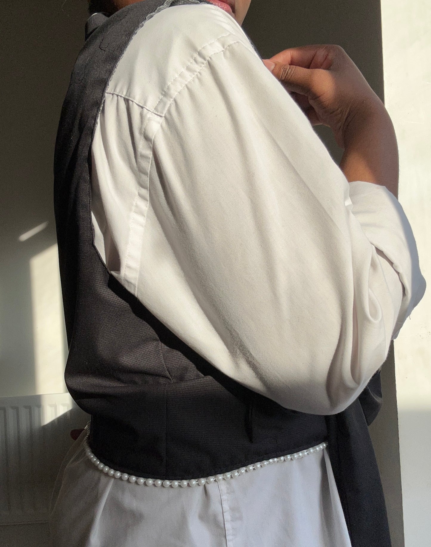 Upcycled waistcoat with a bow