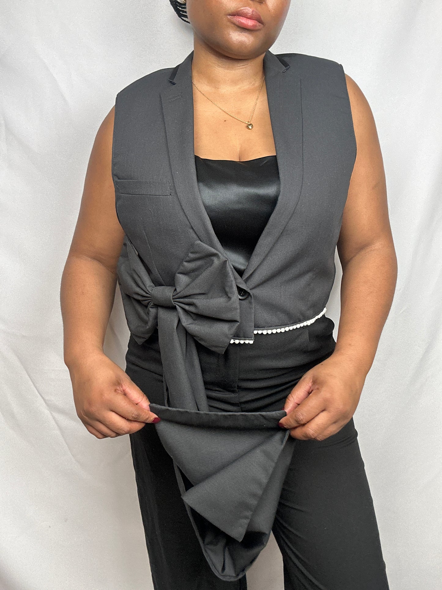 Upcycled waistcoat with a bow