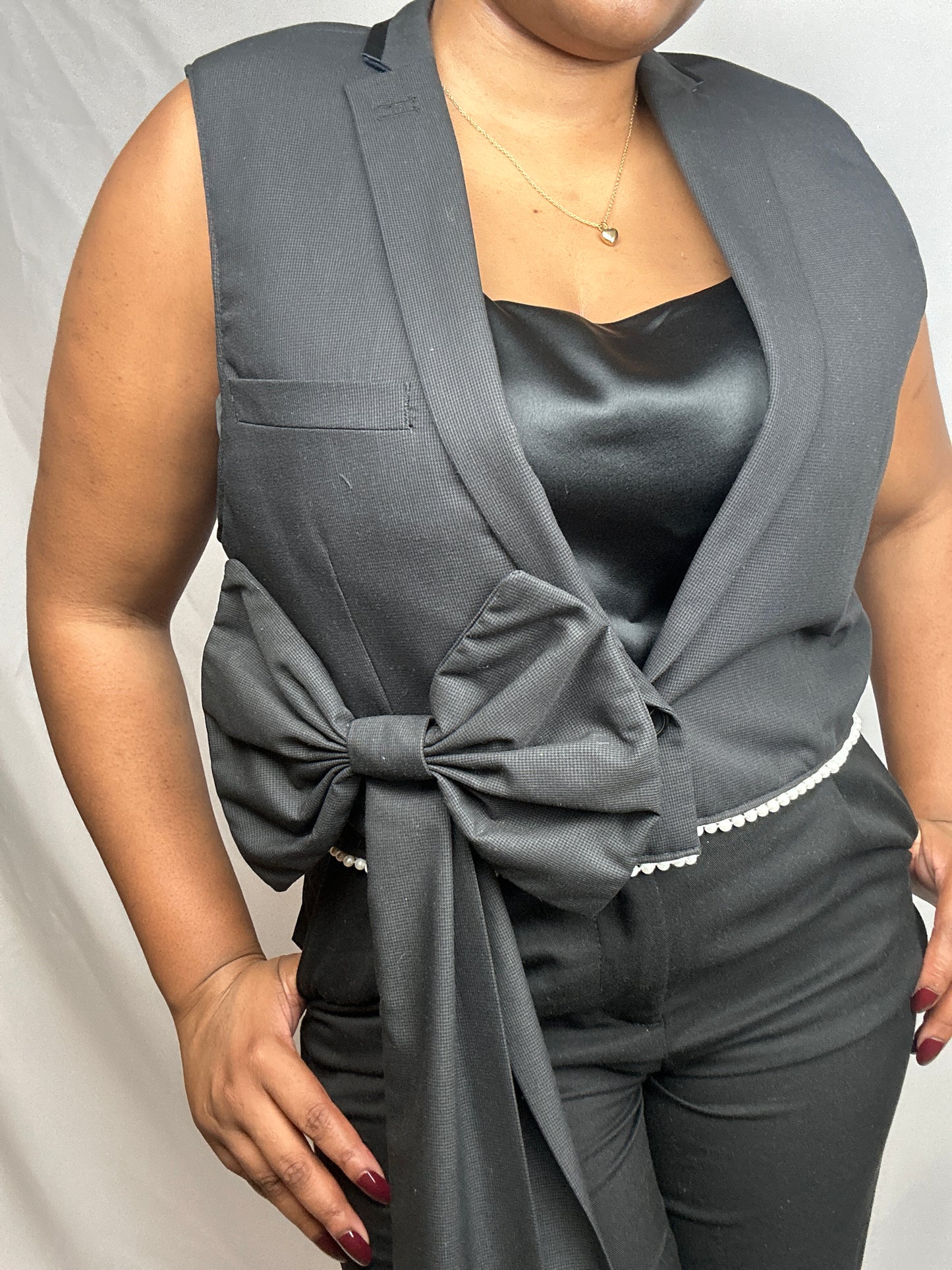 Upcycled waistcoat with a bow