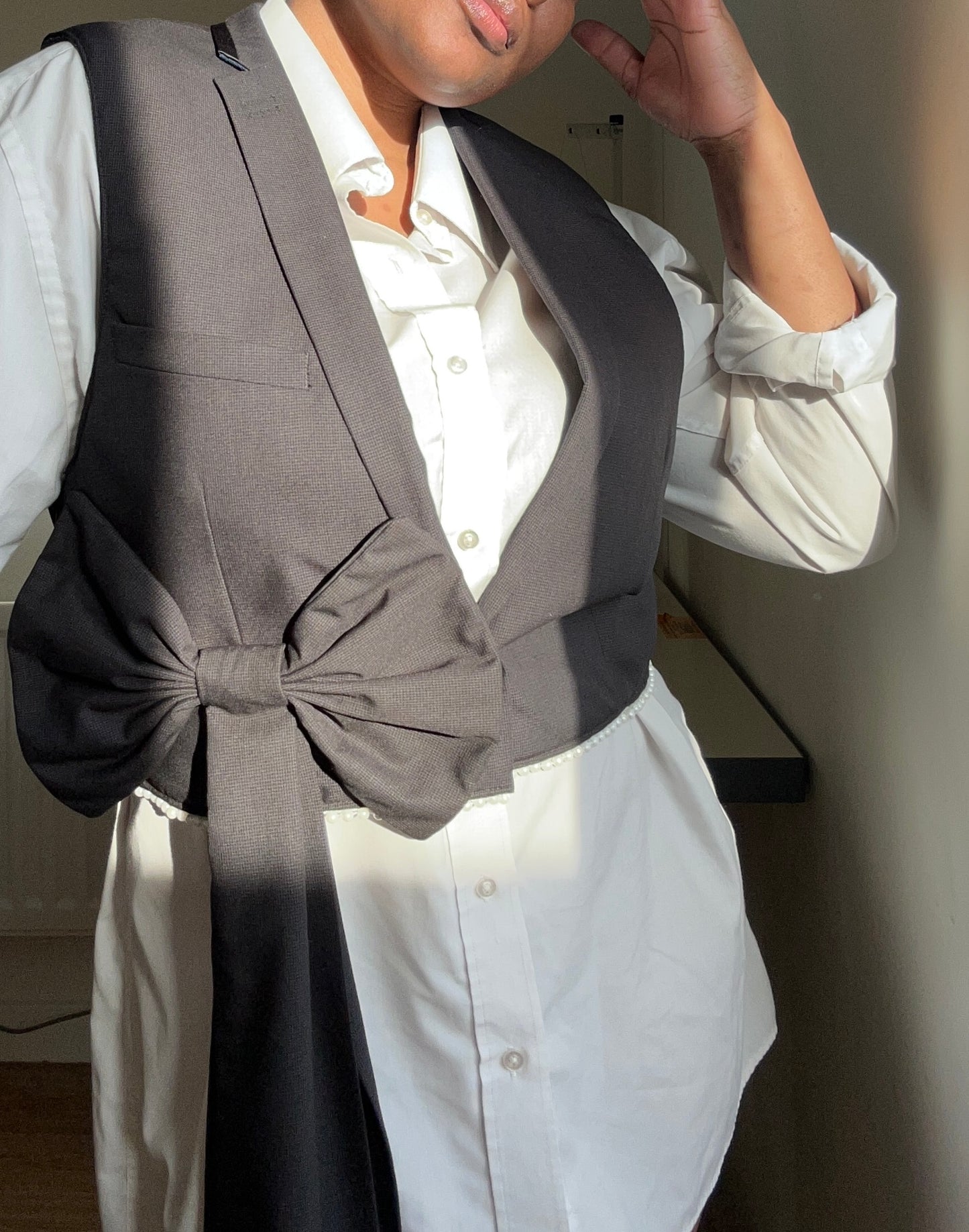 Upcycled waistcoat with a bow