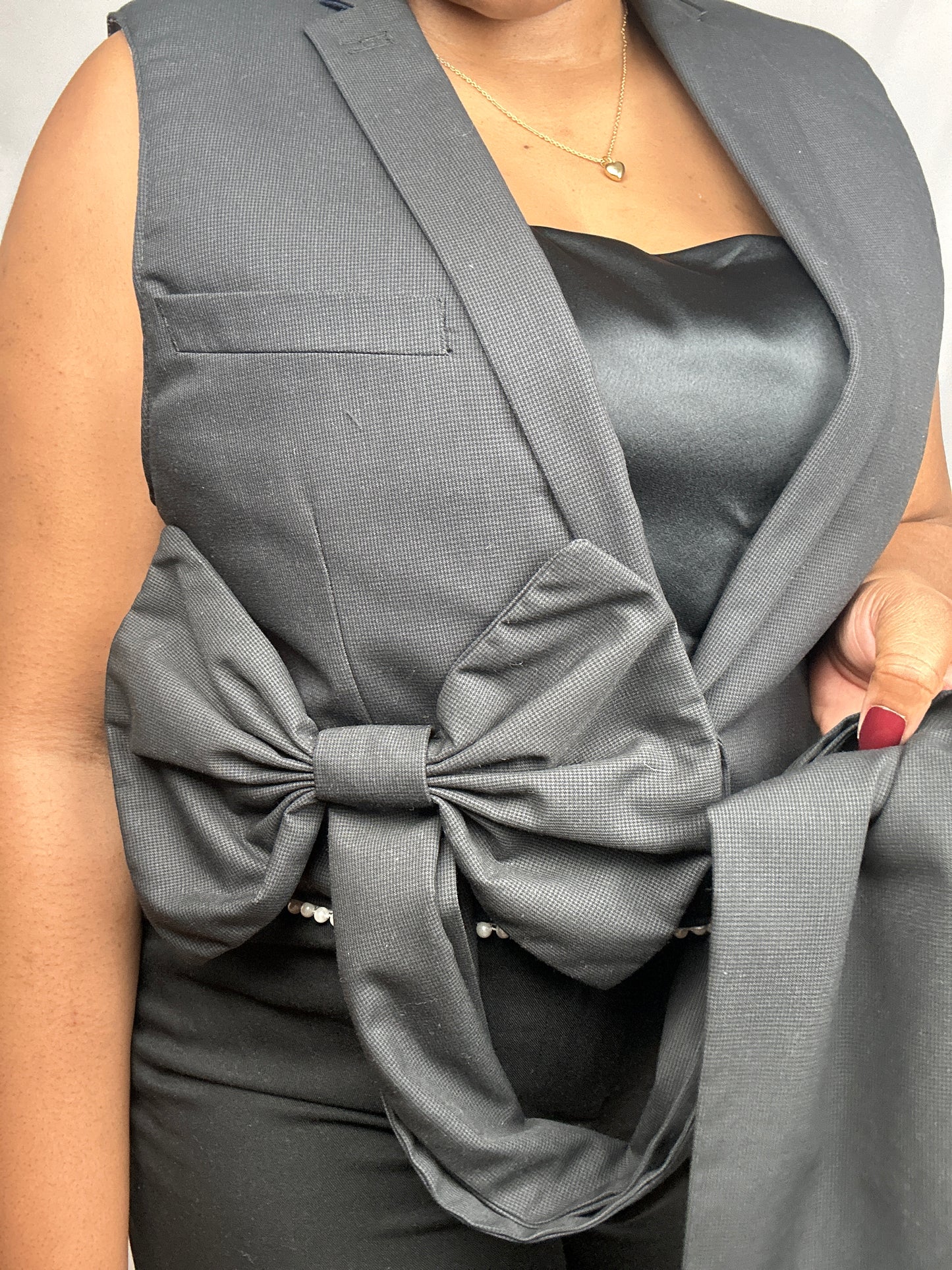 Upcycled waistcoat with a bow